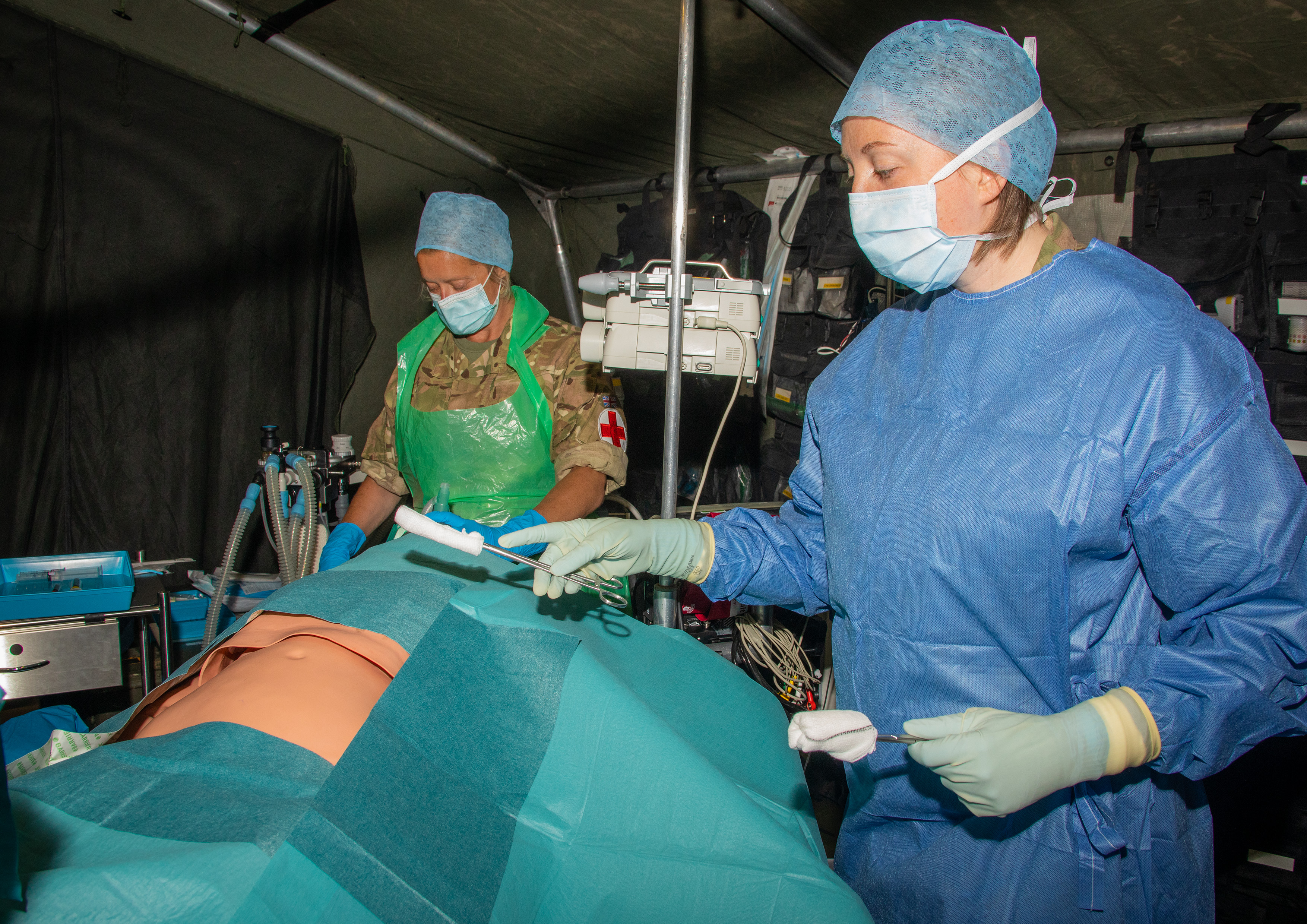RAF Medics work with patient.